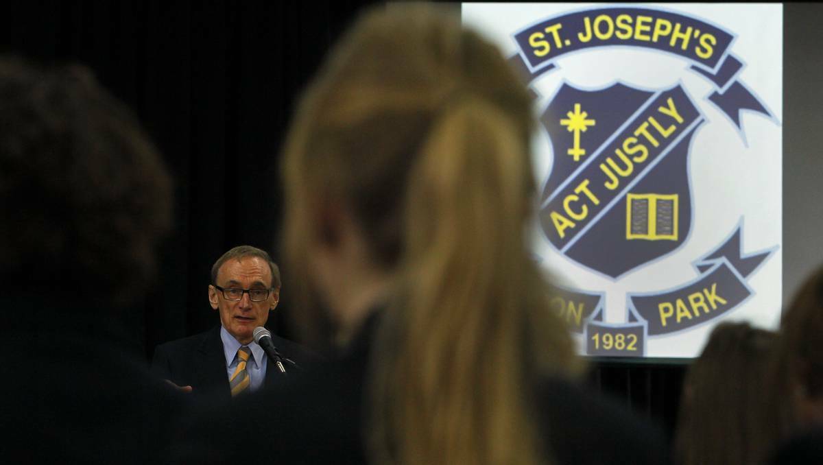 Foreign Affairs Minister Bob Carr answers questions from St Joseph's students in the Illawarra. Picture: Andy Zakeli