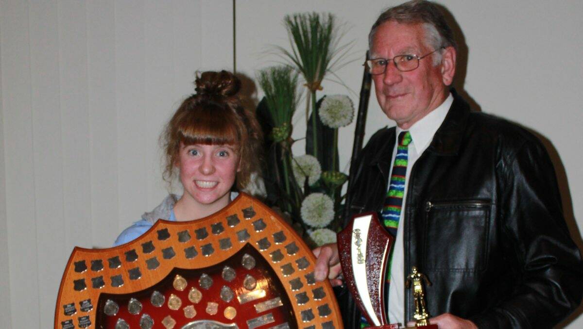 WINNER: MDASA president Robin Alexander presents the Clegg Shield to Hayley Tucker.