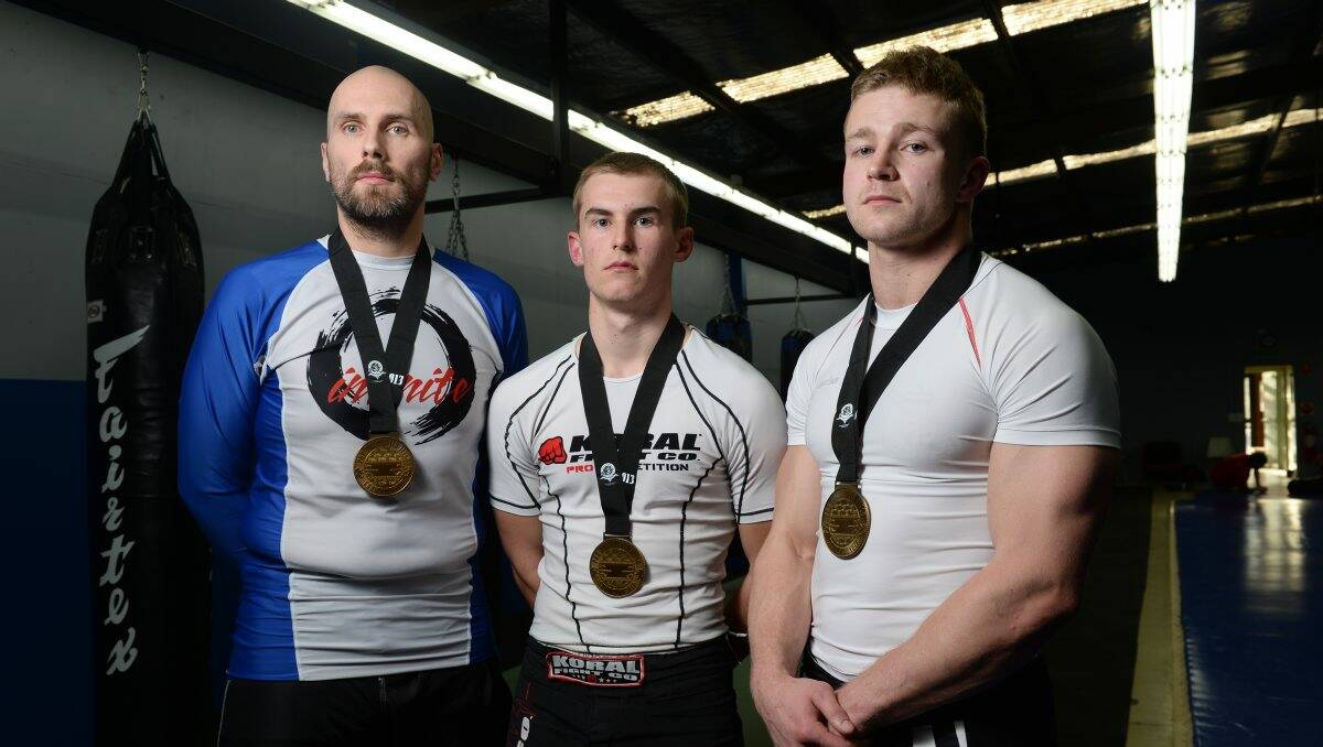 FIGHTERS: Tony Watson, Ryan Knowles and Daniel Currie. PICTURE: ADAM TRAFFORD
