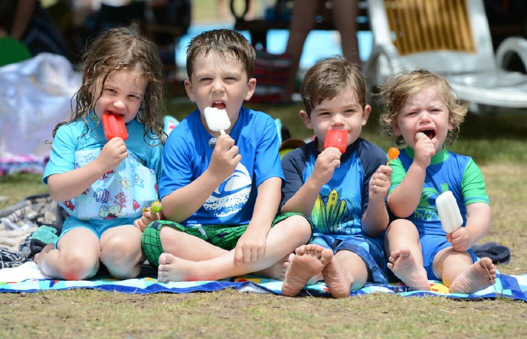 Isabella Battiston, 3, Antony Battiston, 5, Mitch Ward, 3 and Jack Ward, 2 cool off at Eureka Pool yesterday. As temperature soared yesterday, Musk residents were angered by a planned power cut. 
