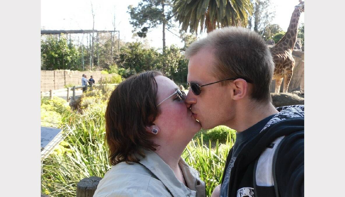 This is my husband and I sharing a kiss at the zoo, one of our favourite places to visit together. We've been together for nine years and are more in love than ever! Laura Ivens 23 and Jason Ivens 27. Submitted by Laura Ivens.
