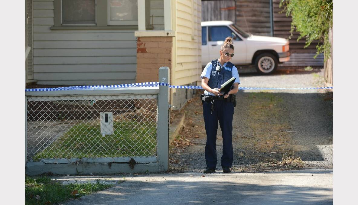 Detectives on scene at the Doveton Street South property. PICTURES: ADAM TRAFFORD.