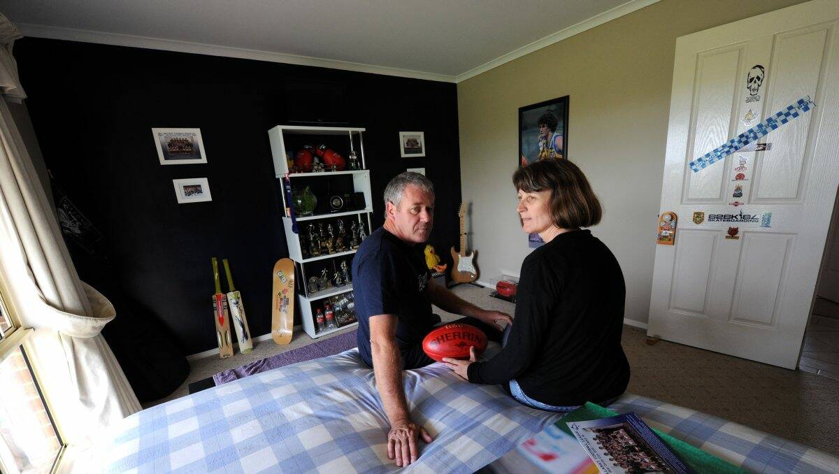 Deeply missed: Bernie Prince and her partner Dean Carr in Nathan’s bedroom. Picture: Jeremy Bannister