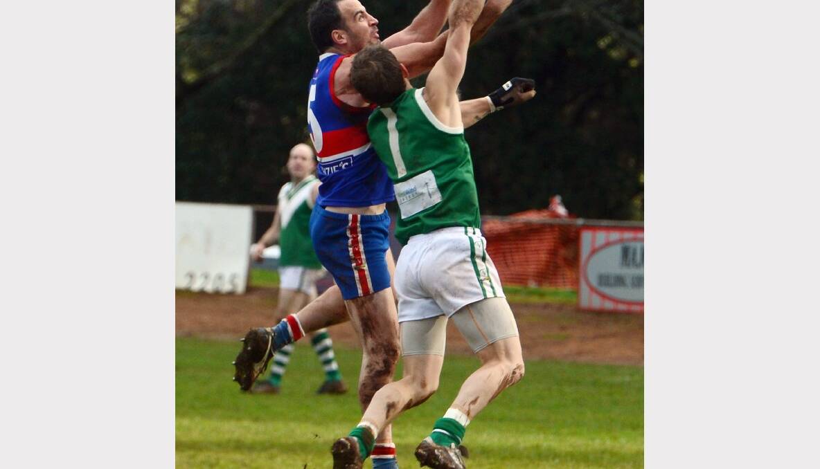 Nick Cronin and Mark Ashmore in the weekend's clash between Daylesford and Rokewood-Corinhap. PICTURE: KATE HEALY.