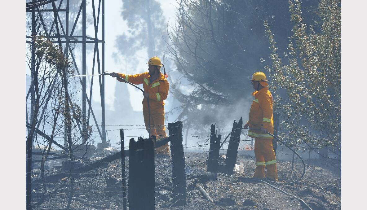 Fire crews work to extinguish the blaze at Blampied. PICTURE: LACHLAN BENCE.