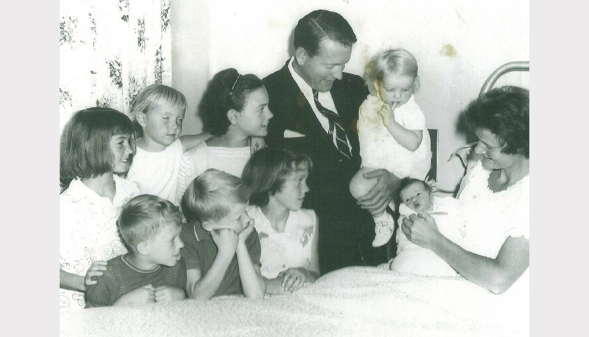 HAPPY FAMILY: Murray Byrne with his wife Adele and their children Anne, Virginia, Jane, Carolyn, David, Andrew, Adele and newborn Rosemary.
