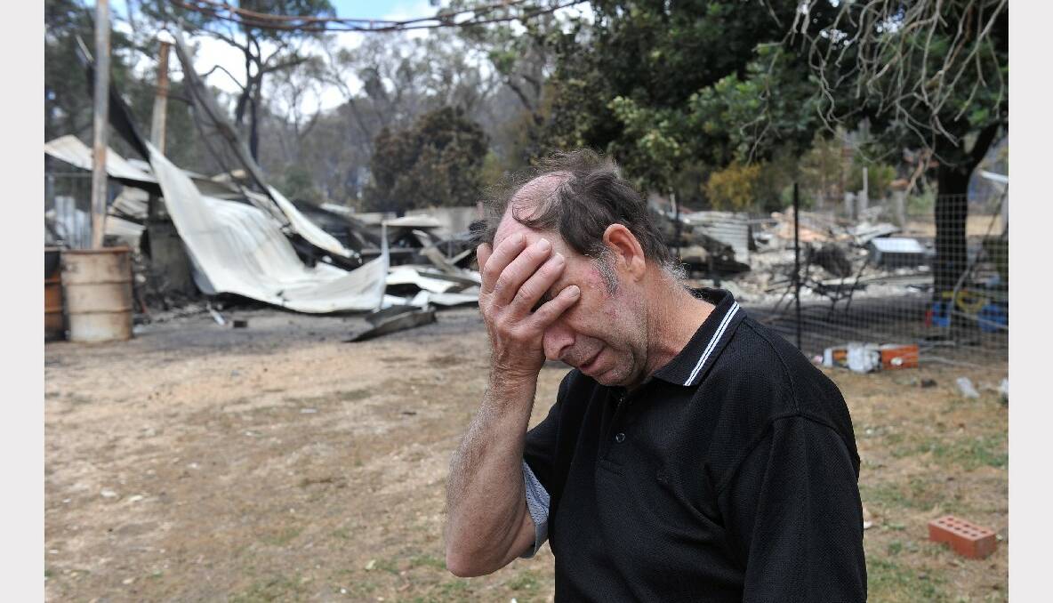 Ray Ellen outside his destroyed home. PICTURE: LACHLAN BENCE. 