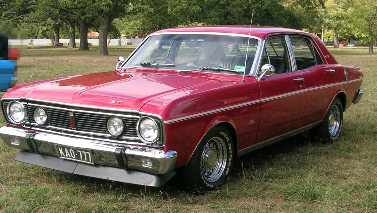 3) My name is Jeff Morcombe and this is our 1968 XT GT Falcon. It is candy apple red in colour with black leather interior. I got married, and bought the GT in 1978. 34 years later I'm still married and still have the car. It is an absolute classic Australian muscle car.