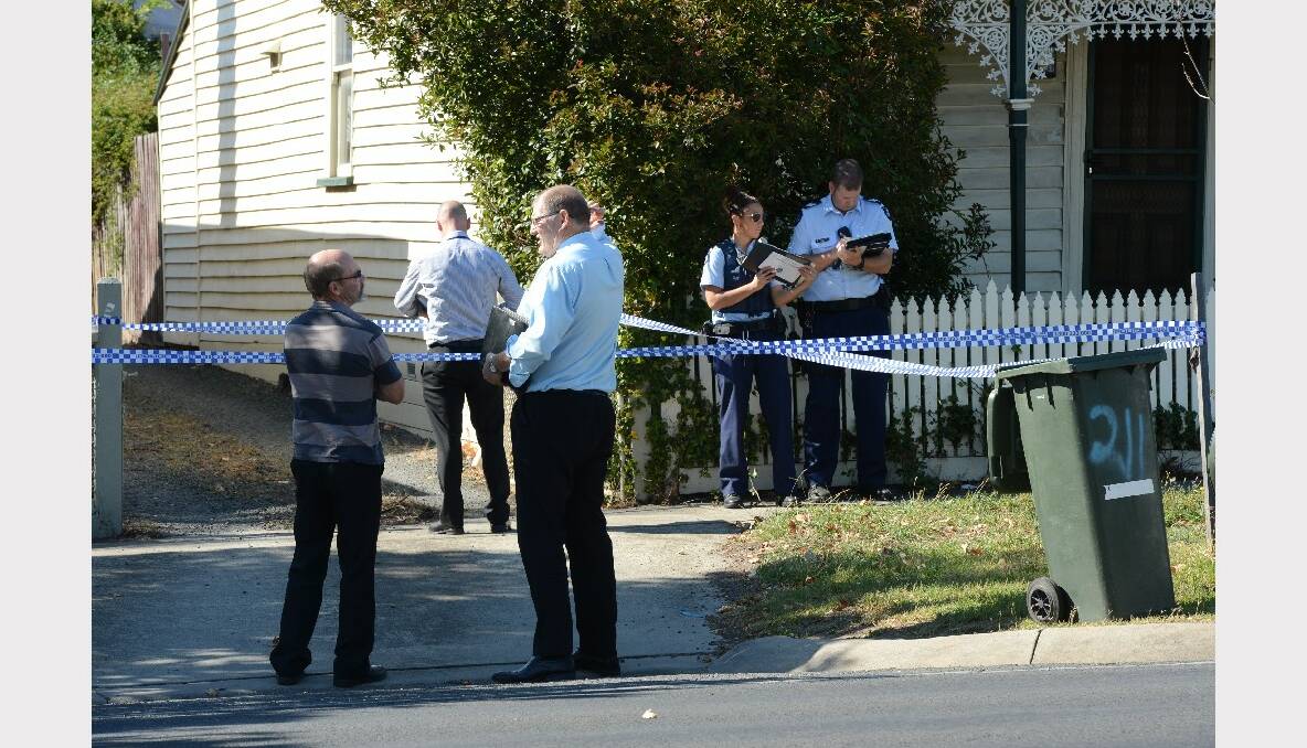 Detectives on scene at the Doveton Street South property. PICTURES: ADAM TRAFFORD.