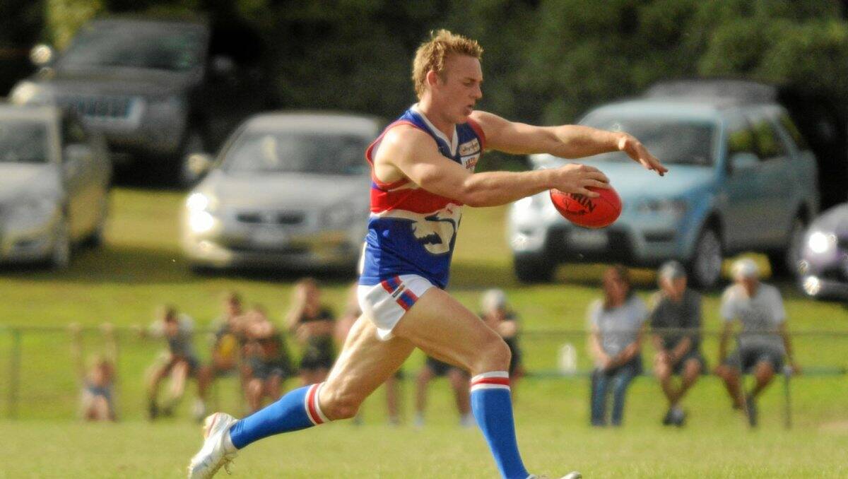 UP IN THE AIR: Daylesford star midfielder Michael Cummings. FILE PHOTO.