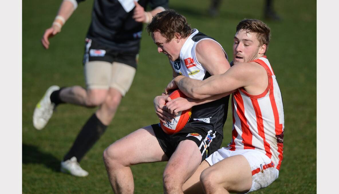 North City's Andy Leahy and Ballarat Swan's Braeden Deary. PICTURE: ADAM TRAFFORD. 