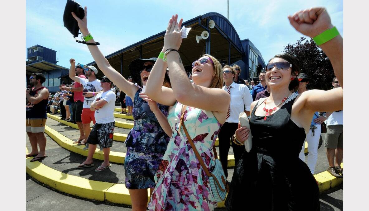 Talia Auchettl, Nicole Belsar and Aley Earl cheer home the winning horse. PICTURE: JEREMY BANNISTER
