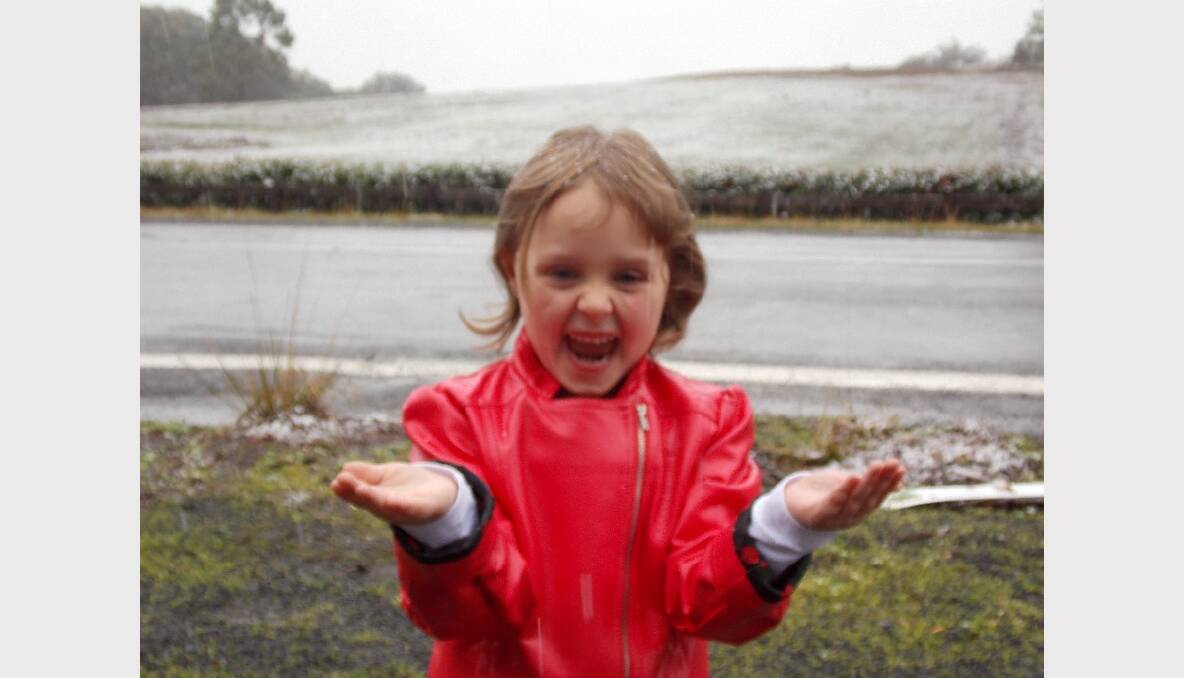 This is my daughter Justyce,seeing snow for the very first time. Taken in Gordon by Shirlene Lauri