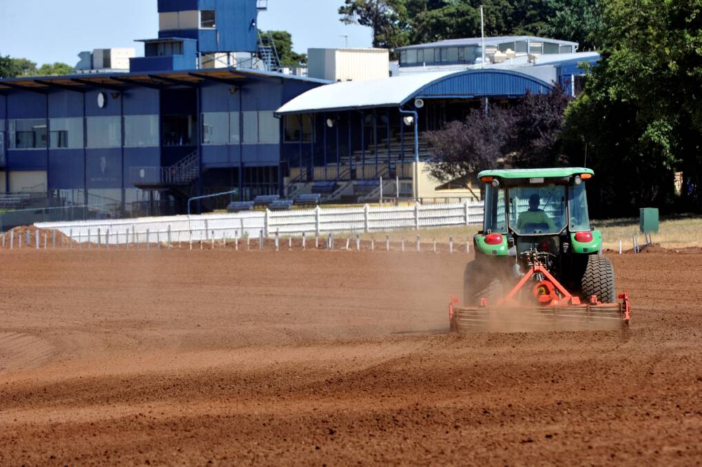 Preparing the home turn and home straight in readiness for new turf.