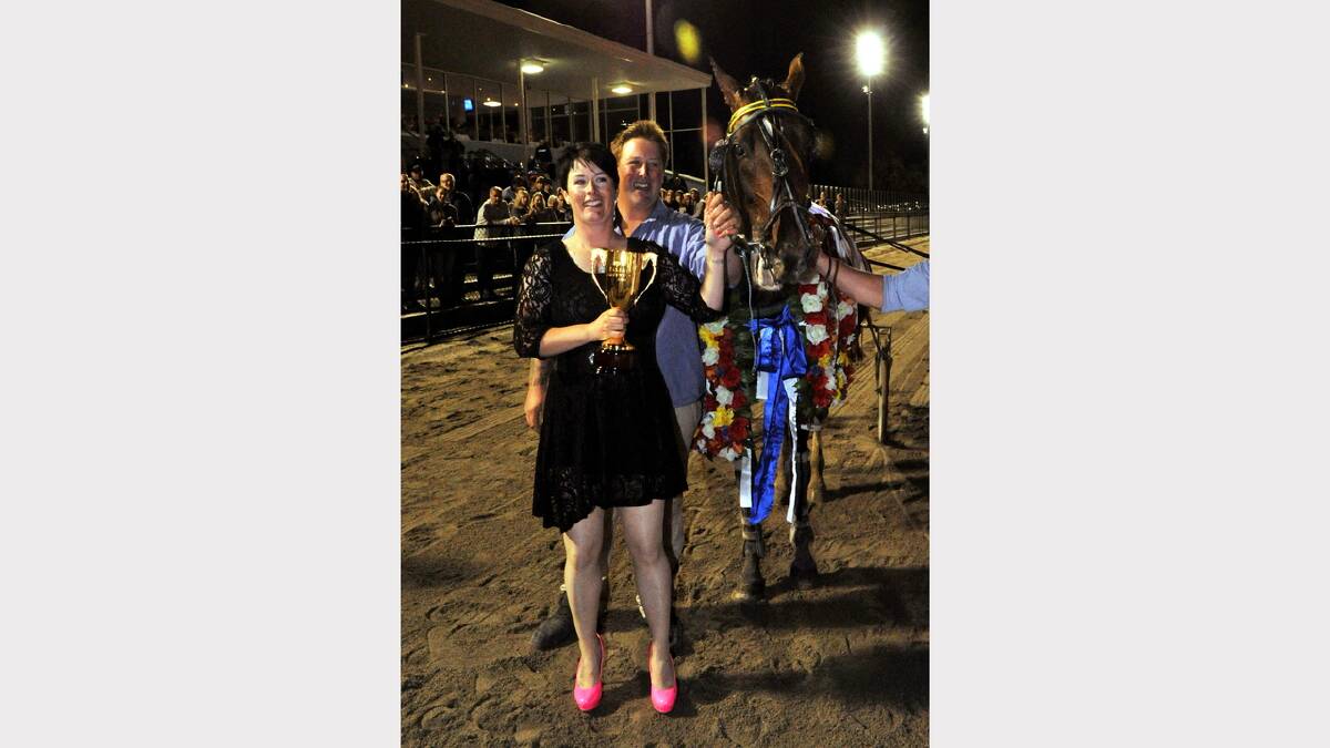 Co trainers Emma Stewart and Clayon Tonkin celebrate their Ballarat Pacing Cup win with Restrepo