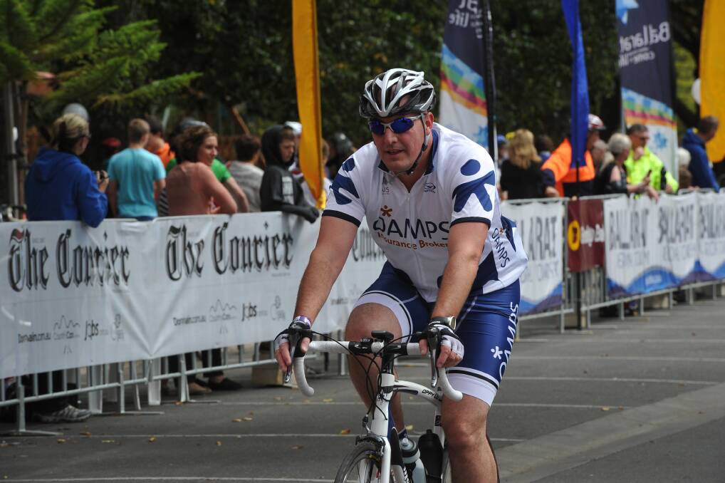 Road race competitors cross the finish line. PIC: Lachlan Bence