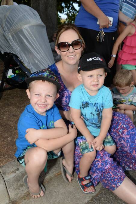 Harkey James, 4, Ashlea James, and Mason James, 2, at The Courier Begonia Parade. PICTURE: KATE HEALY