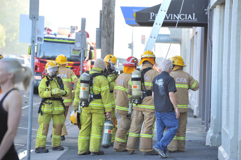 Firefighters battle the blaze in Ballarat's CBD. PIC: Lachlan Bence