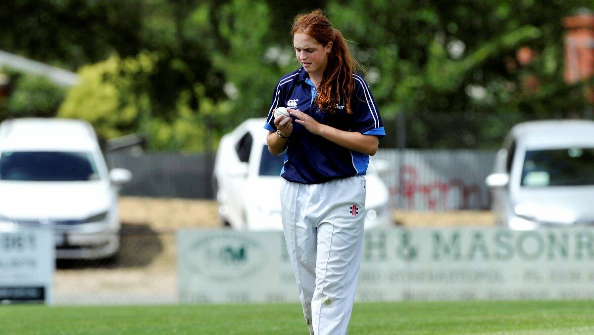 Liz Olney works on the ball for Auckland