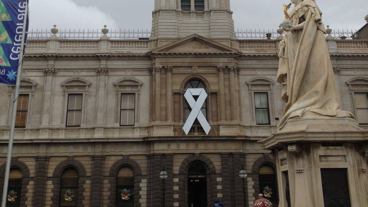 A giant white ribbon hangs from Ballarat's Town Hall.