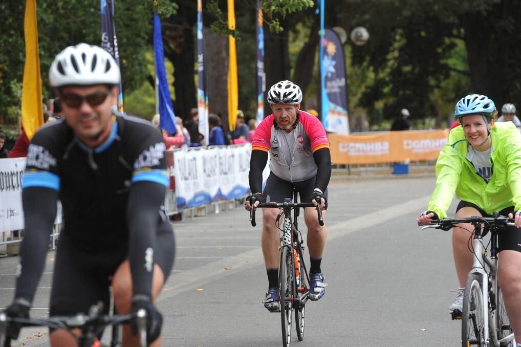 Road race competitors cross the line. PIC: Lachlan Bence