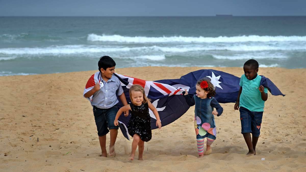 Joel George, 6, Yasmine Brown, 3, Rose Wade, 4, and Ayiga Luka, 6,get ready for Australia Day