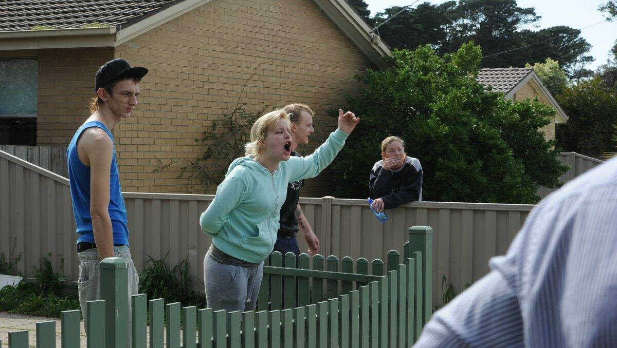 Police confront angry residents following the shooting incident last September. Picture: Justin Whitelock
