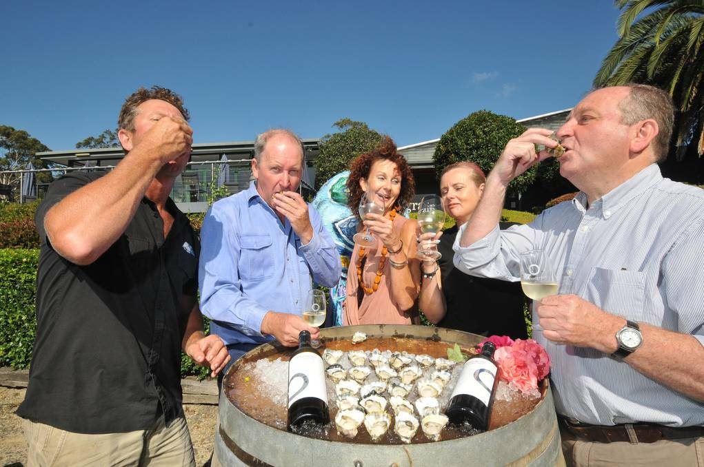  Brandon Armstrong, Mark Bulley, Necia Waghorn, Miyram Barker and John Cassegrain show how to down and oyster in preparation for Sunday's Oysters and Artists Market in the Vines.
