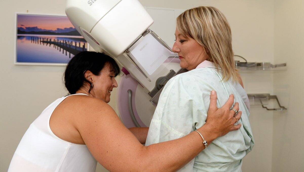 The Courier's Kim Quinlan undergoes a mammogram at Breast Screen Victoria. Picture: Kate Healy