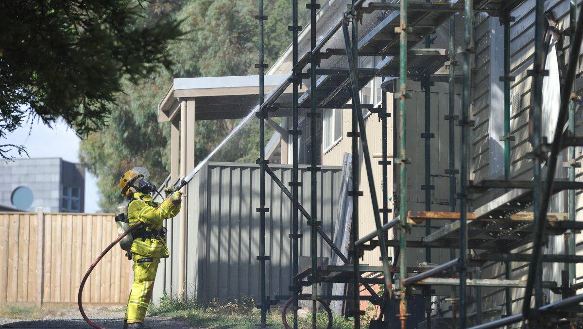 Firefighters tackle the blaze at the old church. PIC: Lachlan Bence