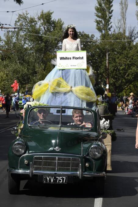 Amy Miller with the White's Florist float at The Courier Begonia Parade. PICTURE: JEREMY BANNISTER