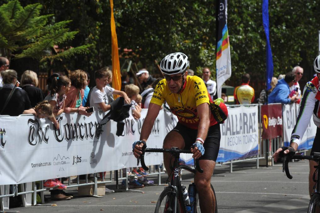Road race cyclists cross the line. PIC: Lachlan Bence