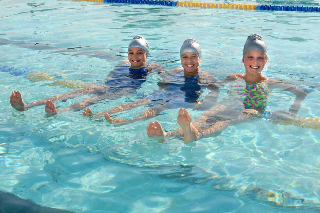 Horsham Swimming Club juniors Bella Geue, 11, Miette Hopper, 11, and Layla Atherton, 12, will be at the Victorian Country Swimming Championships in Wodonga, starting Friday. Picture: SAMANTHA CAMARRI