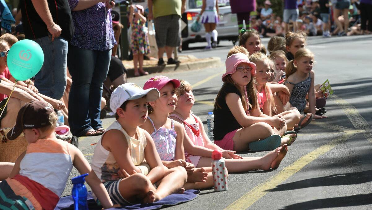 Children lined up along Wendouree Parade for The Courier Begonia Parade. PICTURE: JEREMY BANNISTER