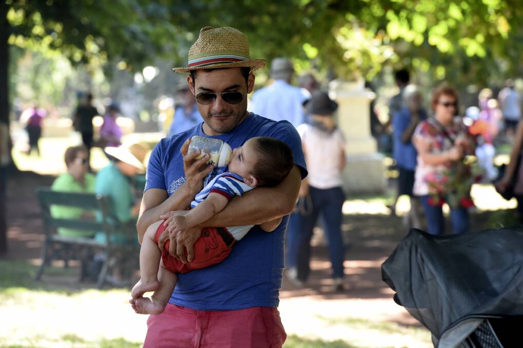 Javier Valderrama and son Oscar take a break under the trees PIC: JEREMY BANNISTER 