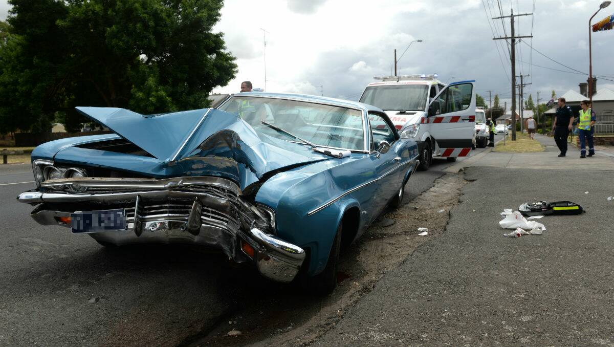 The 1966 Chevrolet Impala which hit a power pole on Main Road today. PICTURE: ADAM TRAFFORD
