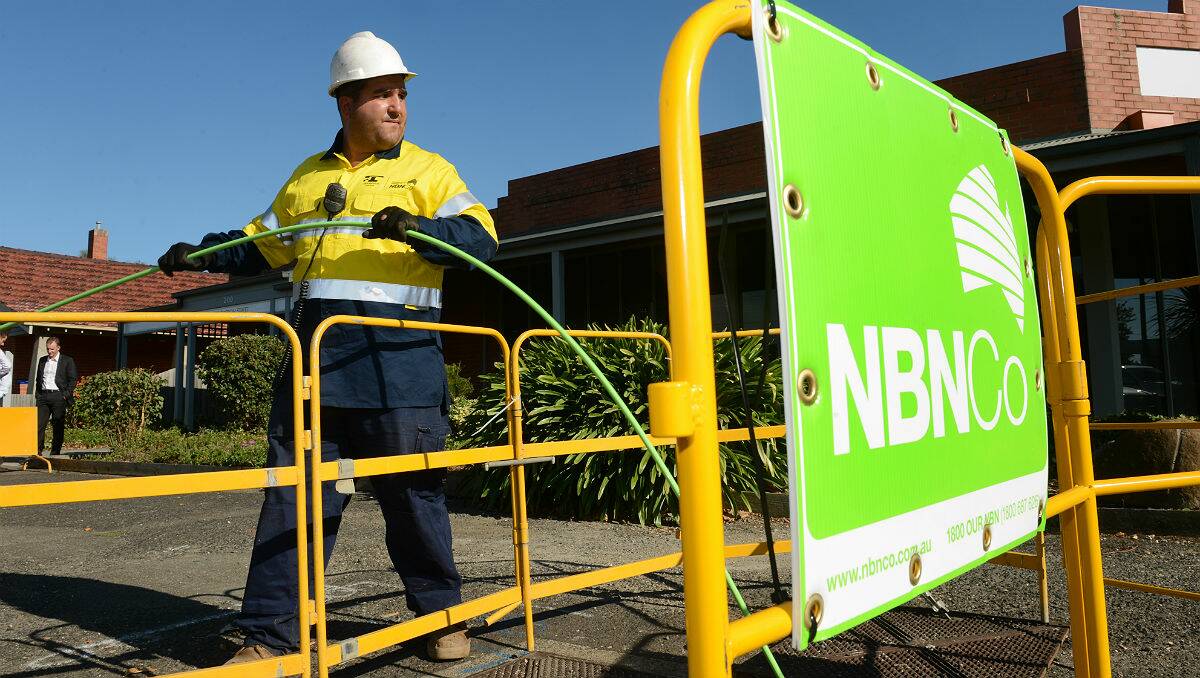 An NBN worker rolling out fibre-optic cable in Ballarat earlier this year. PICTURE: ADAM TRAFFORD
