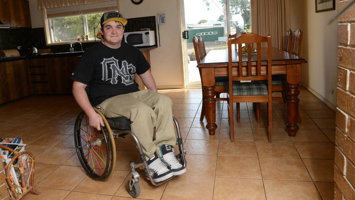 Life in a wheelchair hasn't kept James Finlay from getting back on a bike. PICTURE: KATE HEALY