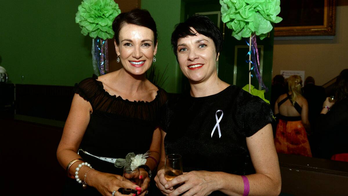 Rebecca Unmack and Amanda Binion at the fundraiser for Aron Siermans. PICTURE: KATE HEALY 