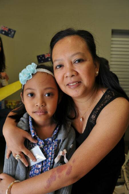 Cheryl Aquino and seven-year-old Ysabelle Aquino. PICTURE: LACHLAN BENCE