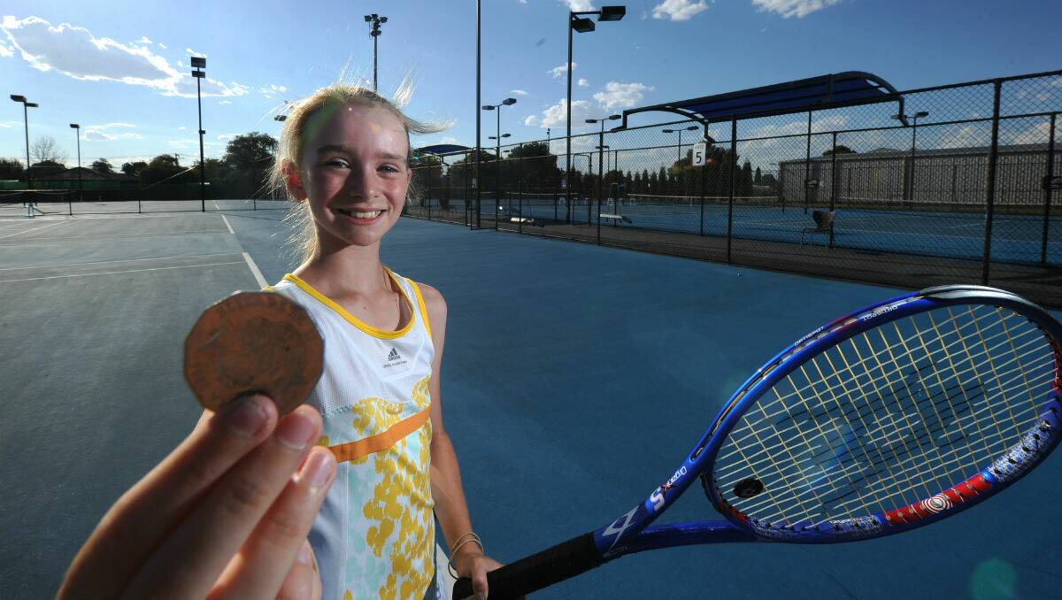 Sarah Burke, 10, will toss the coin for a women's round of 16 match on Sunday. PICTURE: JUSTIN WHITELOCK