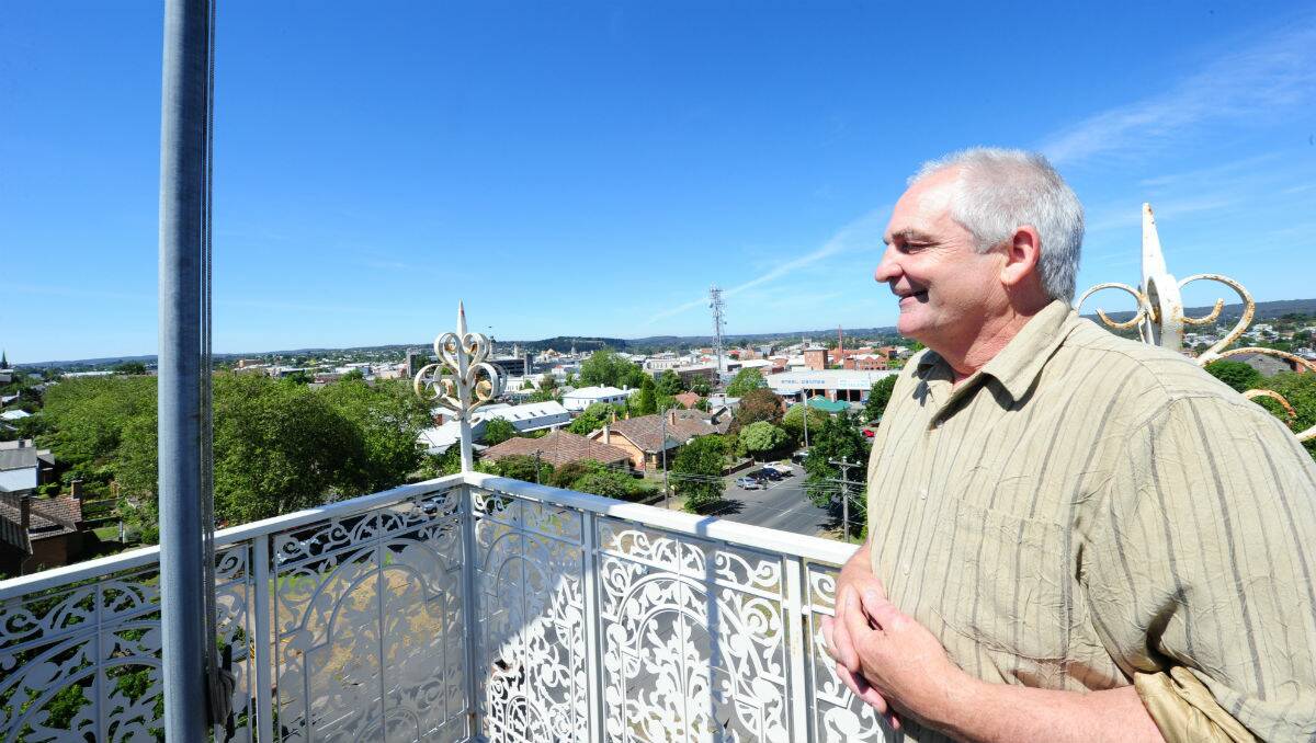 Ray Dymock on the roof of the old boarding house at the corner of Eyre and Dawson streets. PICTURE: JEREMY BANNISTER
