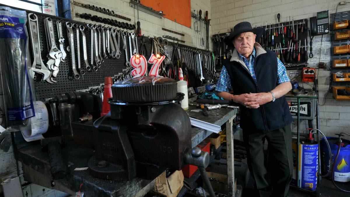 Eric Carthy celebrating his 97th birthday at his business, the Caledonian Garage. PICTURE: JEREMY BANNISTER