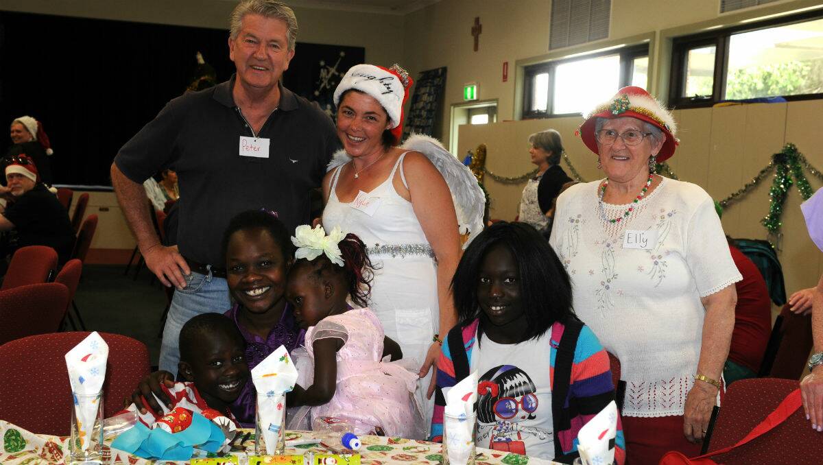 Peter Storey, Kylie Laudan and Elly Green at back, Jak, Martha, Rachel and Nyanal Chol at front. PICTURE: JUSTIN WHITELOCK
