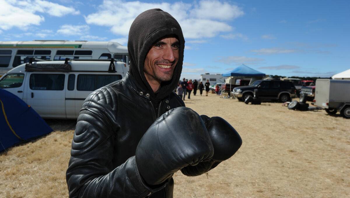 Anton Mealy keeps his hands warm at the Ballarat Swap Meet on Saturday. PICTURE: JUSTIN WHITELOCK