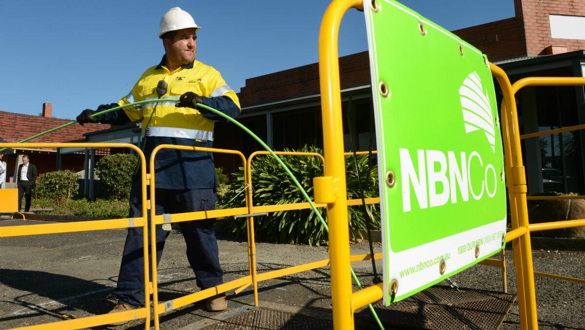 An NBN worker rolling out the first fibre-optic cables in Ballarat yesterday. PICTURE: ADAM TRAFFORD