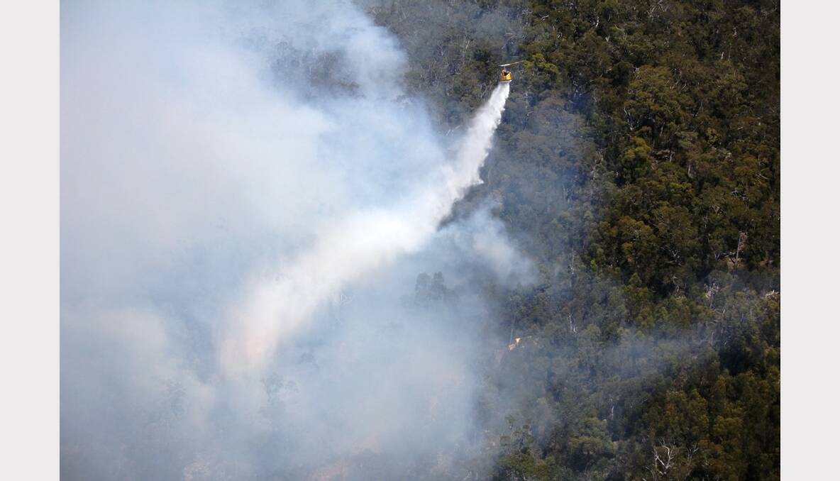  Fighting the Forcett Fire from the sky. PHOTO: WAYNE RIGG. 
