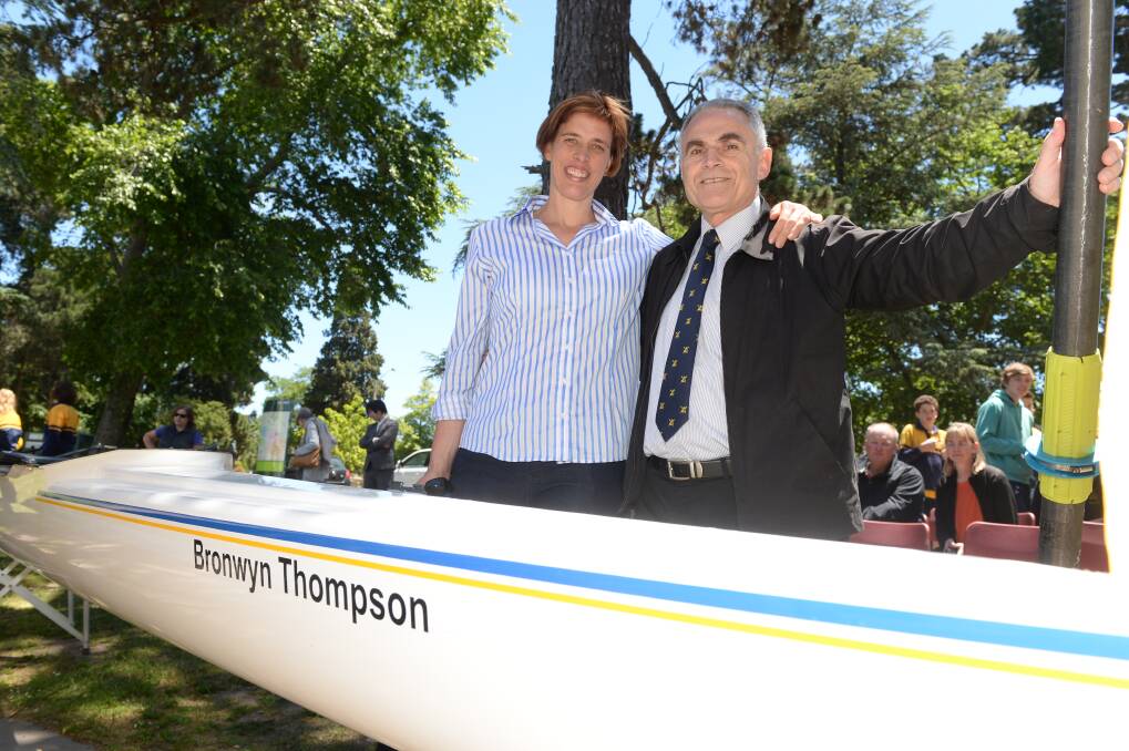Former Olympic rower Bronwyn Thompon and her Ballarat Grammar coach Rob Gray celebrate the naming of a new boat after the rower. Picture: KATE HEALY