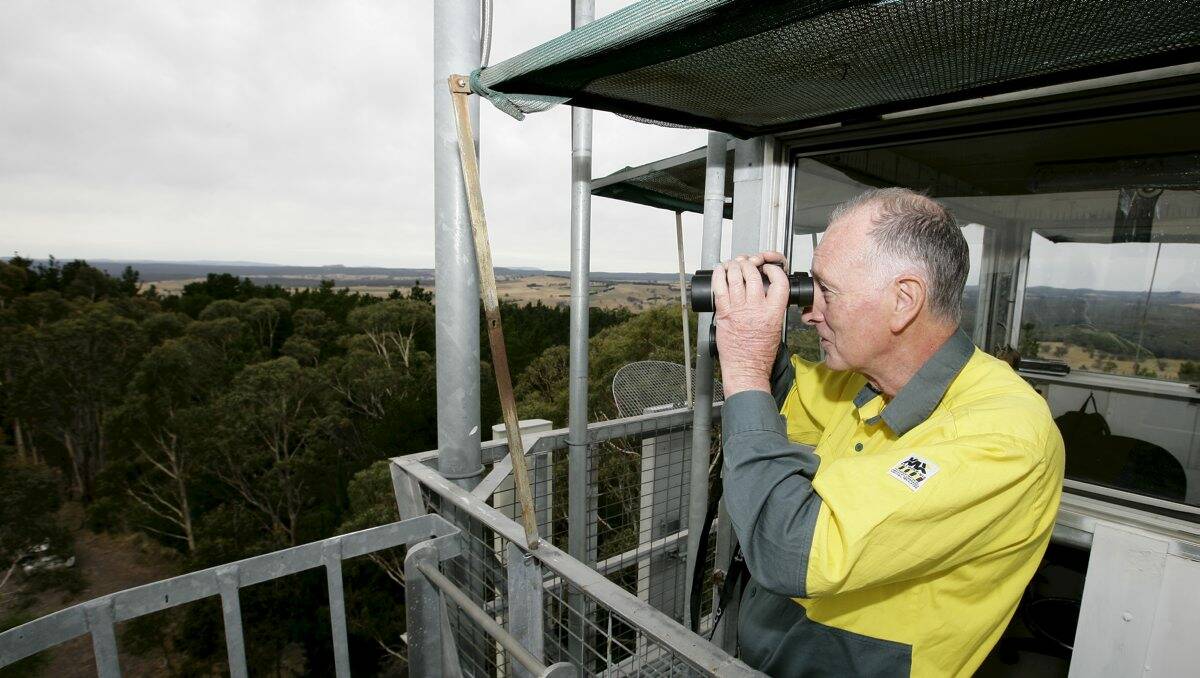 John Marion surveys the area from the fire tower at Mt Franklin. PICTURE: CRAIG HOLLOWAY