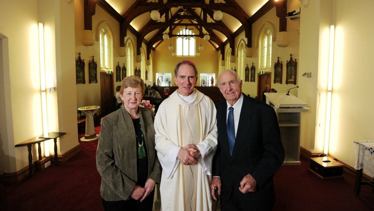 Margaret Green and Tom Mullane with Bishop Paul Bird at Ballan’s St Brigid’s Catholic Church’s 100th birthday celebrations yesterday. 